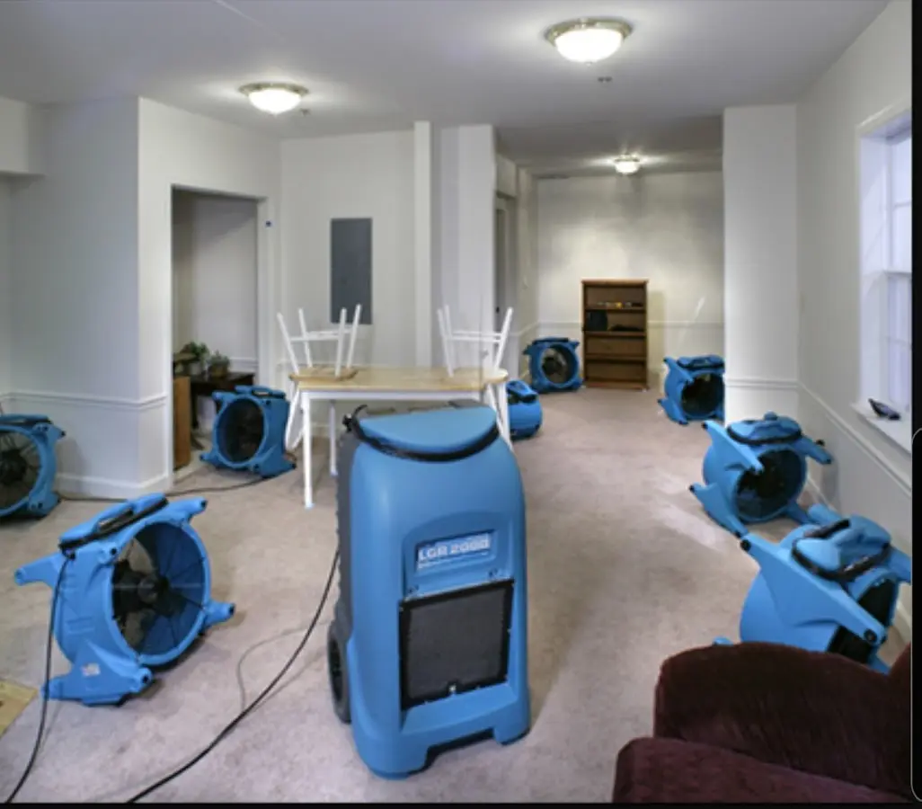 Air movers and dehumidifier setup for Water Extraction & Removal in Winterville